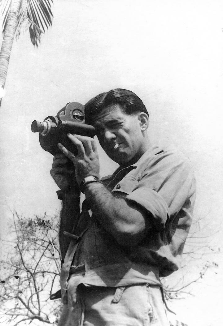 Denny Ayling with Eyemo camera in Burmese jungle